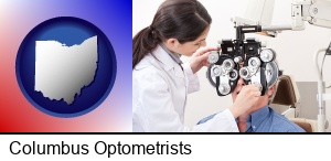 Columbus, Ohio - female optometrist performing a sight test