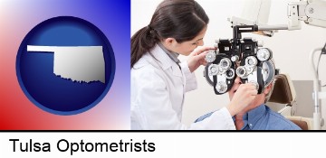 female optometrist performing a sight test in Tulsa, OK