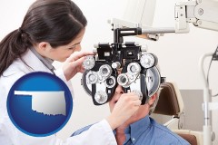 female optometrist performing a sight test - with OK icon