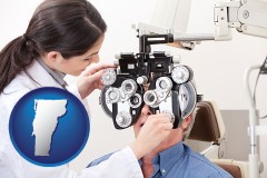 vermont map icon and female optometrist performing a sight test