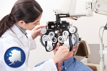 female optometrist performing a sight test - with Alaska icon