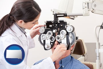 female optometrist performing a sight test - with South Dakota icon