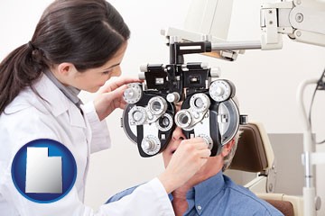 female optometrist performing a sight test - with Utah icon