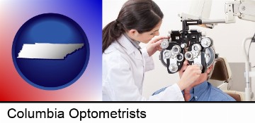 female optometrist performing a sight test in Columbia, TN