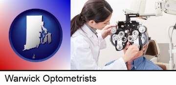 female optometrist performing a sight test in Warwick, RI